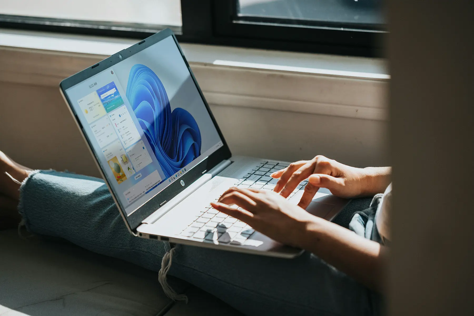 close up image of an hp laptop showing a windows / microsoft screen